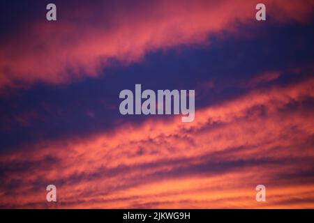 A perfect background of the cloudy sky at sunset Stock Photo