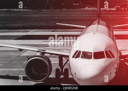 Close-up view of airplane on airfield in airport. Stock Photo