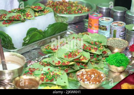 close up photo of a garnished banarasi pan, an indian mouth freshner delicacy made with betel leaves. Stock Photo