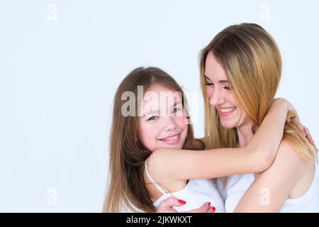 mom daughter hug happy feeling joyful childhood Stock Photo