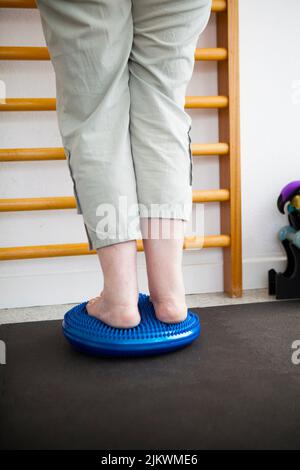 Physiotherapy: balance exercises for vestibular rehabilitation against ...