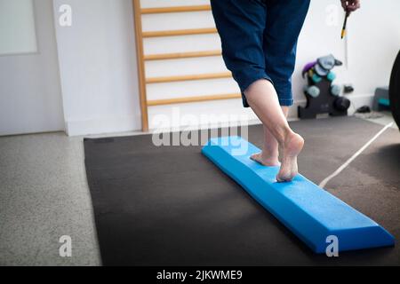 Physiotherapy: balance exercises for vestibular rehabilitation against ...