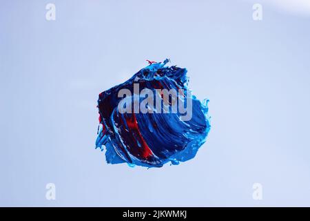 Smear of blue and red oil paint Stock Photo