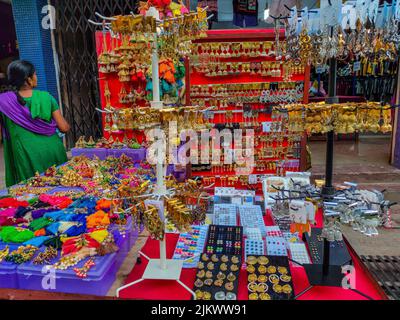 Kolhapur, India- December 4th 2020; Stock photo of beautiful , colorful different types of earnings, bangles, junk jewelery and ornaments display in t Stock Photo