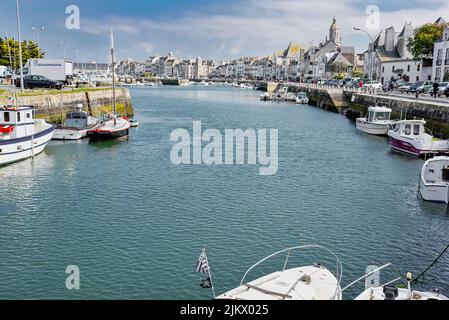 A beautiful shot of boats moored at the harbor of Le Croisic in France on a gloomy day Stock Photo