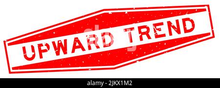 Grunge red upward trend word hexagon rubber seal stamp on white background Stock Vector