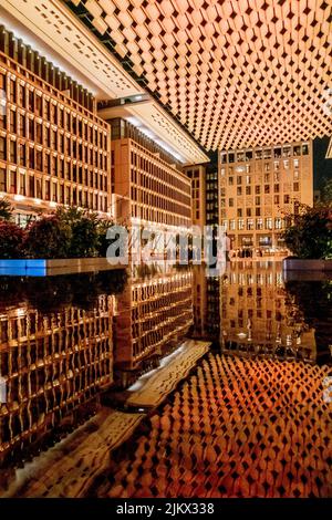 Vertical shot of the the architecture and water pool in Msheireb Downtown Doha, the new center of Doha city Stock Photo