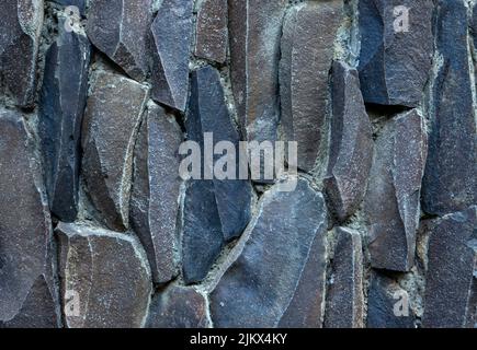 The texture of wall stone, Stonewall as texture and background Stock Photo