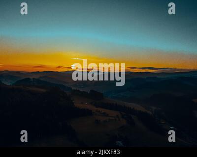 The beautiful view of the hills and sky at sunset. Stock Photo