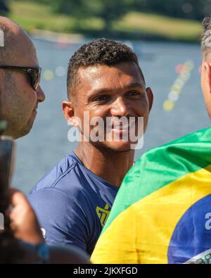 Dartmouth, Canada. August 3rd, 2022. Brazil Olympic Champion Isaquias Queiroz dos Santos wins his qualifying heat in the Men C1 500m race at the World Championships and then comes to celebrate with fans who came to cheer him on. He now moves straight to the finals later this week. The 2022 ICF Canoe Sprint and Paracanoe World Championships takes place on Lake Banook from August 3 - 7 this year in Dartmouth (Halifax). Credit: meanderingemu/Alamy Live News Stock Photo