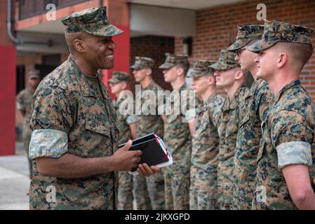 U.S. Marine Corps Lt. Gen. Michael E. Langley, left, commanding general of Marine Forces Command, talks with Marines in the courtyard of Marine Corps Security Force Battalion barracks March 30, 2022, in Kings Bay, Georgia. Langley will become the first Black four-star general in the Marines 246-year history, after the Senate confirmed his promotion August 3rd, 2022.