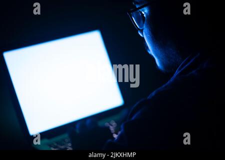 business man typing on laptop keyboard at late night Stock Photo