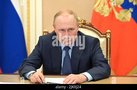 Moscow, Russia. 03rd Aug, 2022. Russian President Vladimir Putin holds a teleconference meeting with Acting Governor of the Yaroslavl Region Mikhail Yevrayev, from the Kremlin, August 3, 2022 in Moscow, Russia. Credit: Mikhail Klimentyev/Kremlin Pool/Alamy Live News Stock Photo