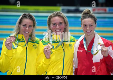 Australia's Ariarne Titmus (centre) with the gold medal, Australia's Kiah Melverton (left) with the bronze medal and Canada's Summer McIntosh with the silver medal after the Women's 400m Freestyle Final at the Sandwell Aquatics Centre on day six of the 2022 Commonwealth Games in Birmingham. Picture date: Wednesday August 3, 2022. Stock Photo