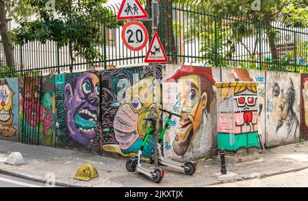 Walls covered with colorful murals depicting cubist portraits, faces in Moda, Kadikoy, istanbul, Turkey, Asian side Stock Photo