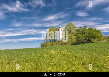 A beautiful shot of St. Michael's Chapel on the Michaelsberg against blue sky on a sunny day near Bruchsal, Germany Stock Photo