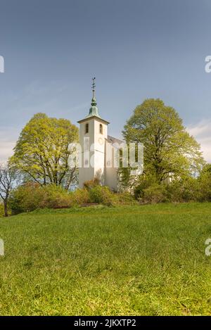 A beautiful shot of St. Michael's Chapel on the Michaelsberg against blue sky on a sunny day near Bruchsal, Germany Stock Photo