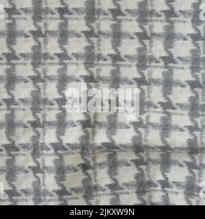 A close-up shot of a Houndstooth wool fabric - perfect for wallpapers Stock Photo