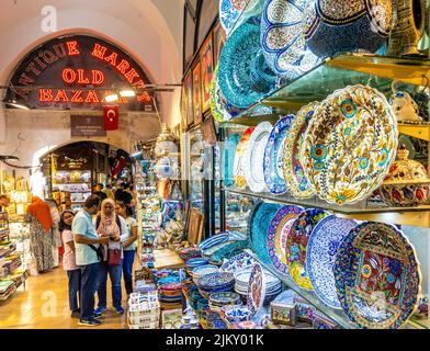 Colorful ceramic ornate plates with decoration sold on display in Antique market, Old Bazaar, Grand Bazaar, Istanbul, Turkey Stock Photo