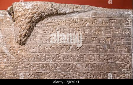 Inscribed slabs from the palace of Sargon II in Dur-Sharrukin ( Khorsabad ) - Detail - Alabaster - 8th century B.C. Stock Photo