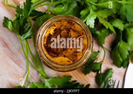 Herring preserves in glass jar Stock Photo
