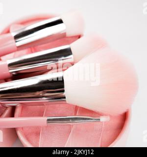 A set of makeup tools on a white background Stock Photo