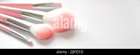 A set of makeup brushes on a white background Stock Photo