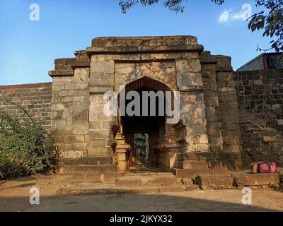 Stock photo of Ancient Hindu temple Kopeshwar Mahadev Mandir Entrance door, Beautiful intricate stone carving around the entrance door of the temple.P Stock Photo