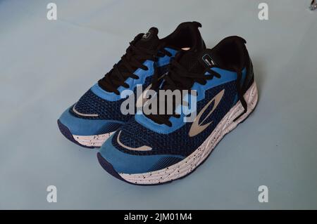 Batam Indonesia. april 22th 2022. local brand shoes from Indonesia with the name nineten. blue running shoes Stock Photo Alamy