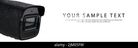 Close-up of a black rainproof CCTV camera. Wet modern camera, space for text. WEB BANNER Stock Photo