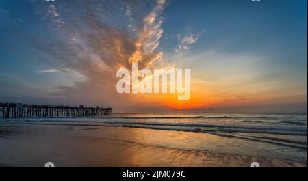 A beautiful view of Flagler Beach Fishing Pier at sunrise in Florida, USA Stock Photo