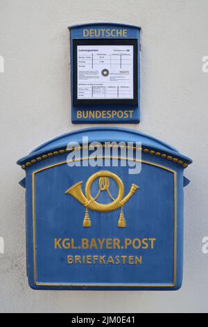 Blue mailbox of the Royal Bavarian Post Office in Rothenburg ob der Tauber, Germany. Stock Photo