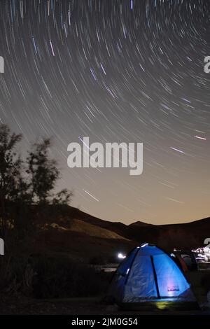 A vertical of a tent with a starry sky Stock Photo - Alamy