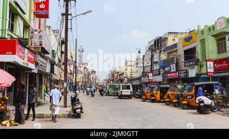 View of West Avani Moola street with auto rickshaw Stand, Madurai, Tamilnadu, India. Stock Photo