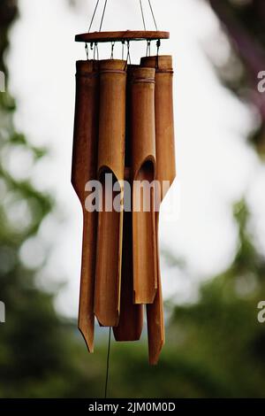A vertical closeup shot of bamboo bells Stock Photo