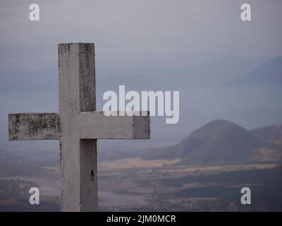 Ancient Greek Christian cross on the old stone wall of the temple Stock ...