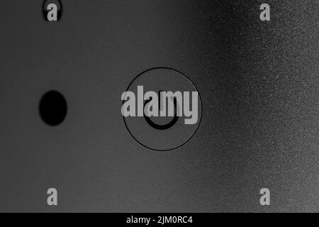 On button icon and ports on low key still life of modern new desktop ...
