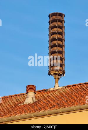 Air raid siren in Denmark - The siren is placed on the roof of the building. Stock Photo