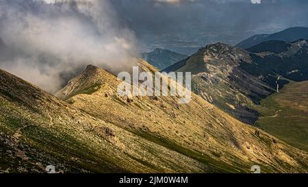 From the path of the Monte Camicia the aerial view of the Campo Imperatore plateau in the Gran Sasso and Monti della Laga National Park. Abruzzo Stock Photo