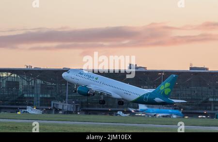 Cork Airport, Cork, Ireland. 04th August, 2022. A Aer Lingus Airbus A320 takes off for an early morning flight to Amsterdam at Cork Airport, Ireland. - Credit; David Creedon / Alamy Live News Stock Photo