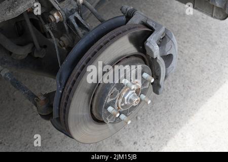 brake disk and detail of the wheel hub, removed tire. Change tire Stock Photo