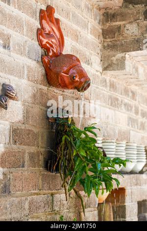 Landscape with flowing water plants in the garden Stock Photo