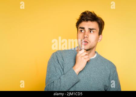 puzzled confused man scratch beard thinking Stock Photo