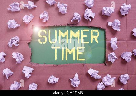 Text sign showing Summer Time. Business idea Longer daylight Tropical season Beach activities Vacation Important Ideas Written Under Ripped Cardboard Stock Photo