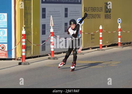ISTANBUL, TURKEY - MARCH 27, 2022: Skater in Istanbul half marathon Stock Photo