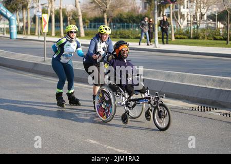 ISTANBUL, TURKEY - MARCH 27, 2022: Skaters in Istanbul half marathon Stock Photo