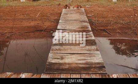 closeup wooden walkway on the water Stock Photo