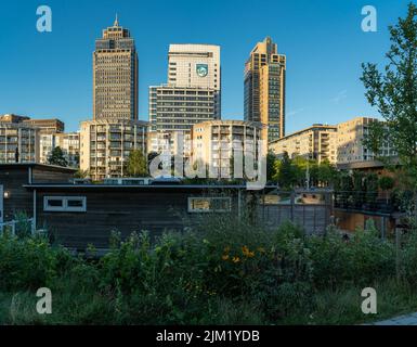 Amsterdam, The Netherlands, 02.08.2022, View of Rembrandt tower, headquarters of Philips in  Breitner Tower, and Mondriaan tower along the Amstel Stock Photo