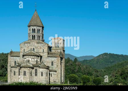 Romanesque church of Saint Nectaire, regional natural park of the Auvergne volcanoes, Puy de Dome, Auvergne Rhone Alpes, France Stock Photo