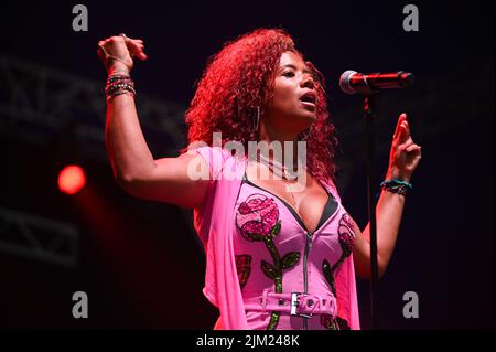 Kelis Rogers-Mora, commonly known as Kelis, performs her hit song Milkshake at Tramlines Festival in Sheffield. Stock Photo